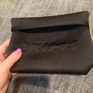 Skims pouch never used